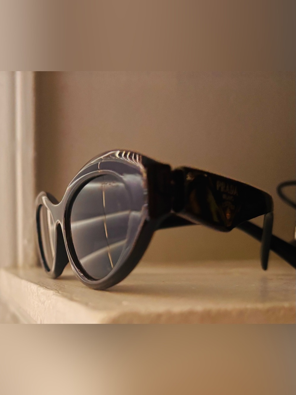 Prada Round Frame Sunglasses in Black
